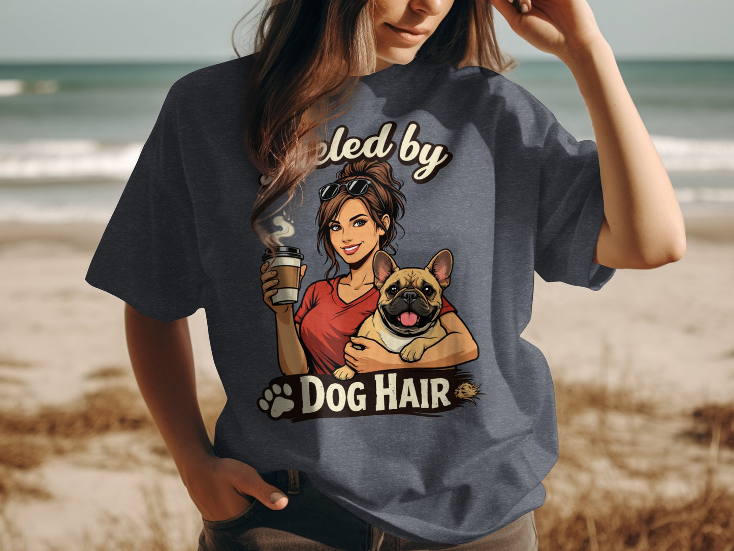 T-shirt graphic with woman holding coffee and French bulldog, text "Fueled by Dog Hair."
