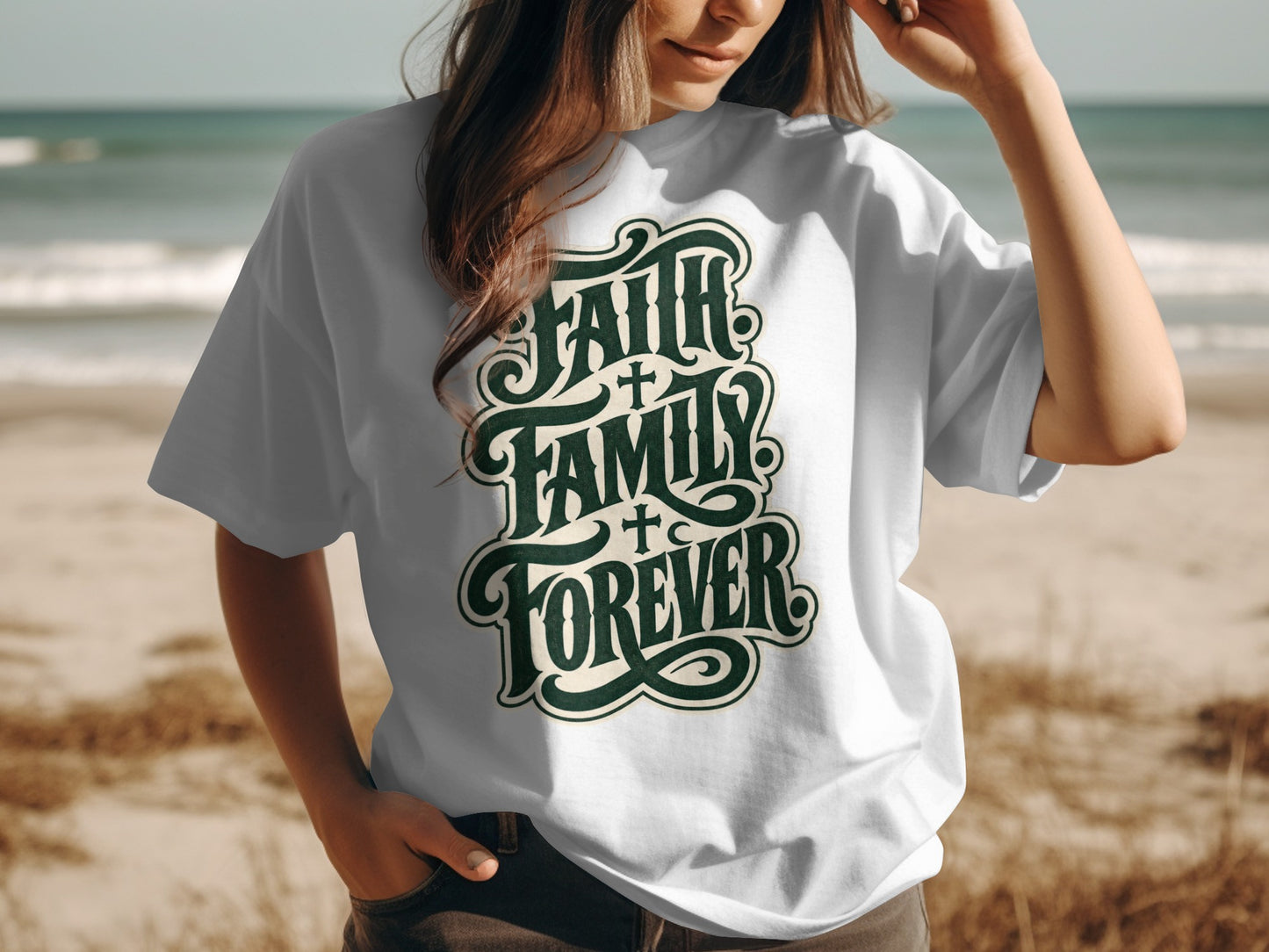 White t-shirt with "Faith Family Forever" script text on a beach background.