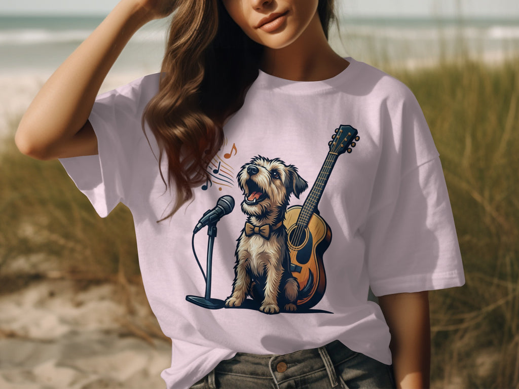 Dog wearing bowtie singing into microphone next to guitar on t-shirt.