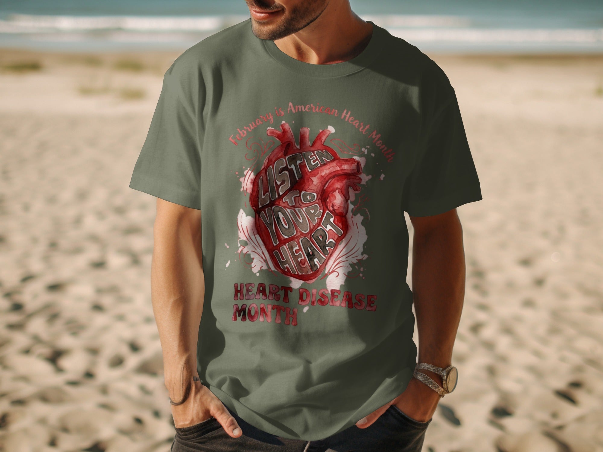 Green t-shirt with watercolor heart graphic and text "Listen to Your Heart".