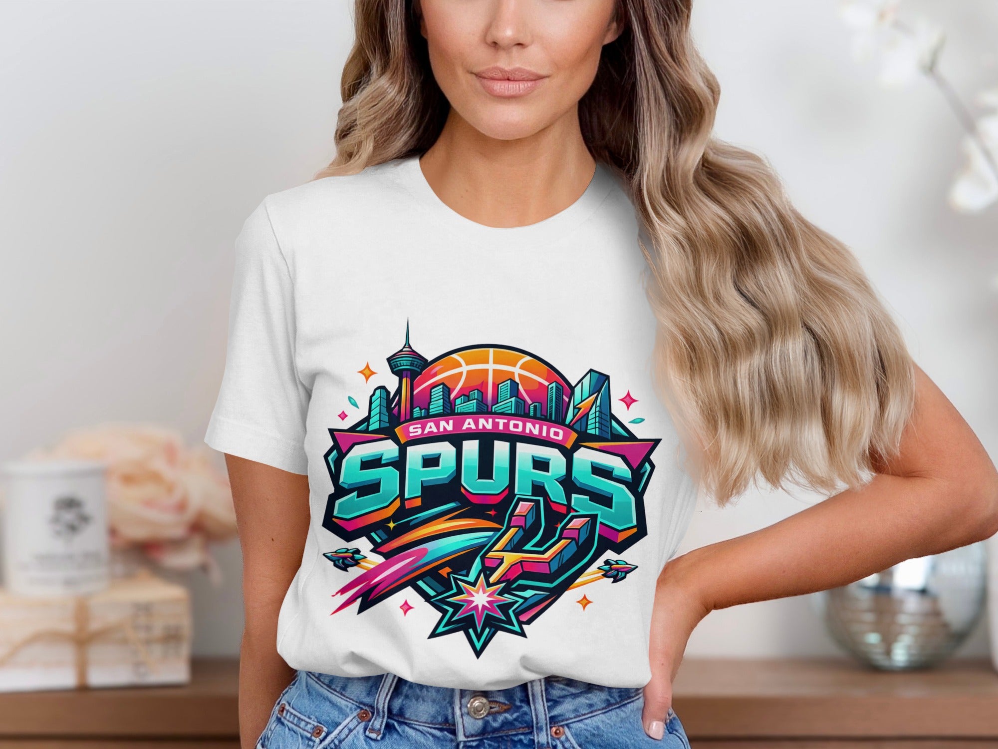 White t-shirt with colorful San Antonio Spurs logo featuring cityscape and basketball.