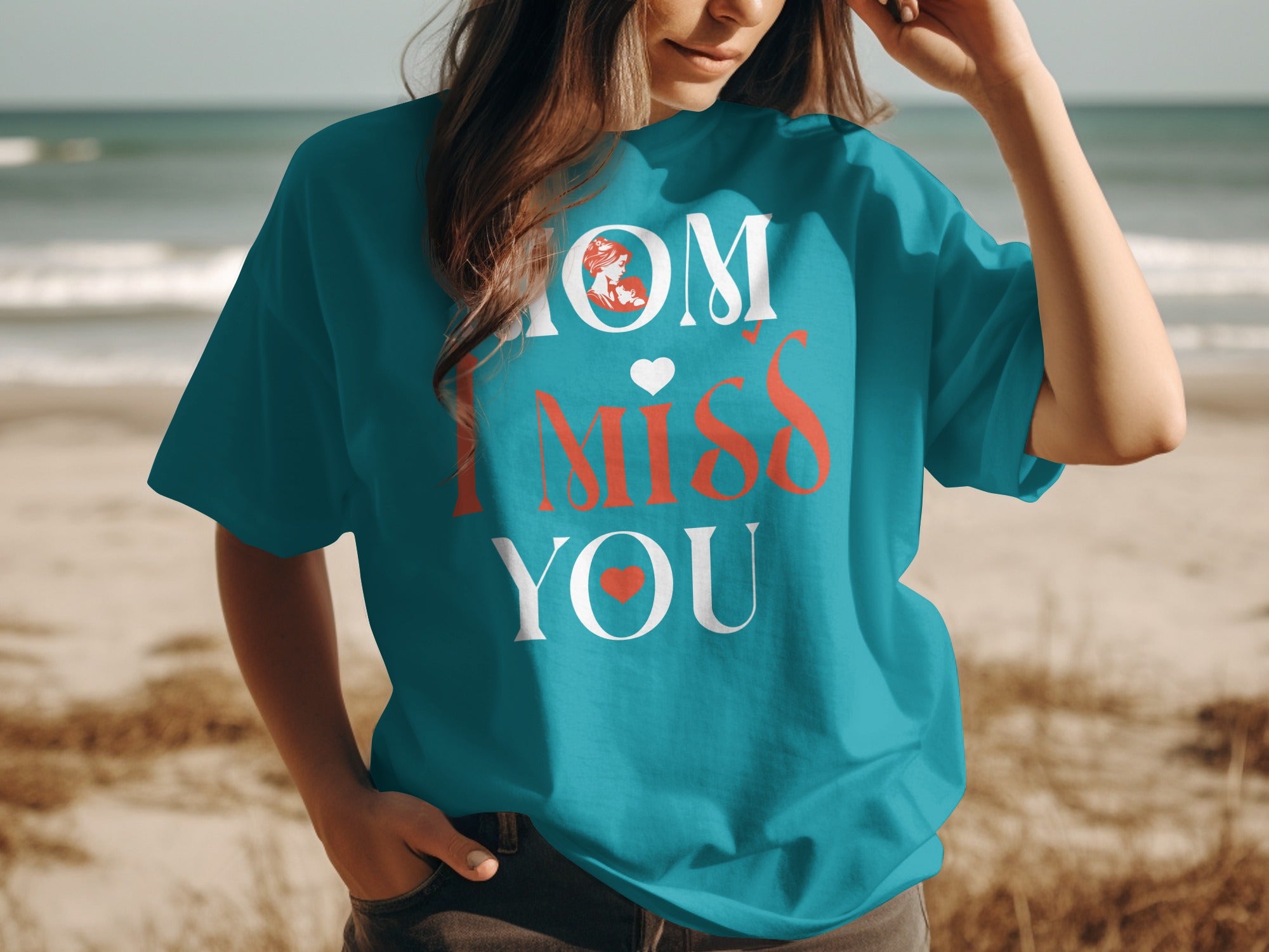 Teal t-shirt with "MOM I MISS YOU" graphic and a mother and child illustration.