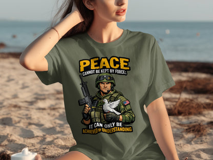 Soldier holding dove with text: Peace cannot be kept by force.
