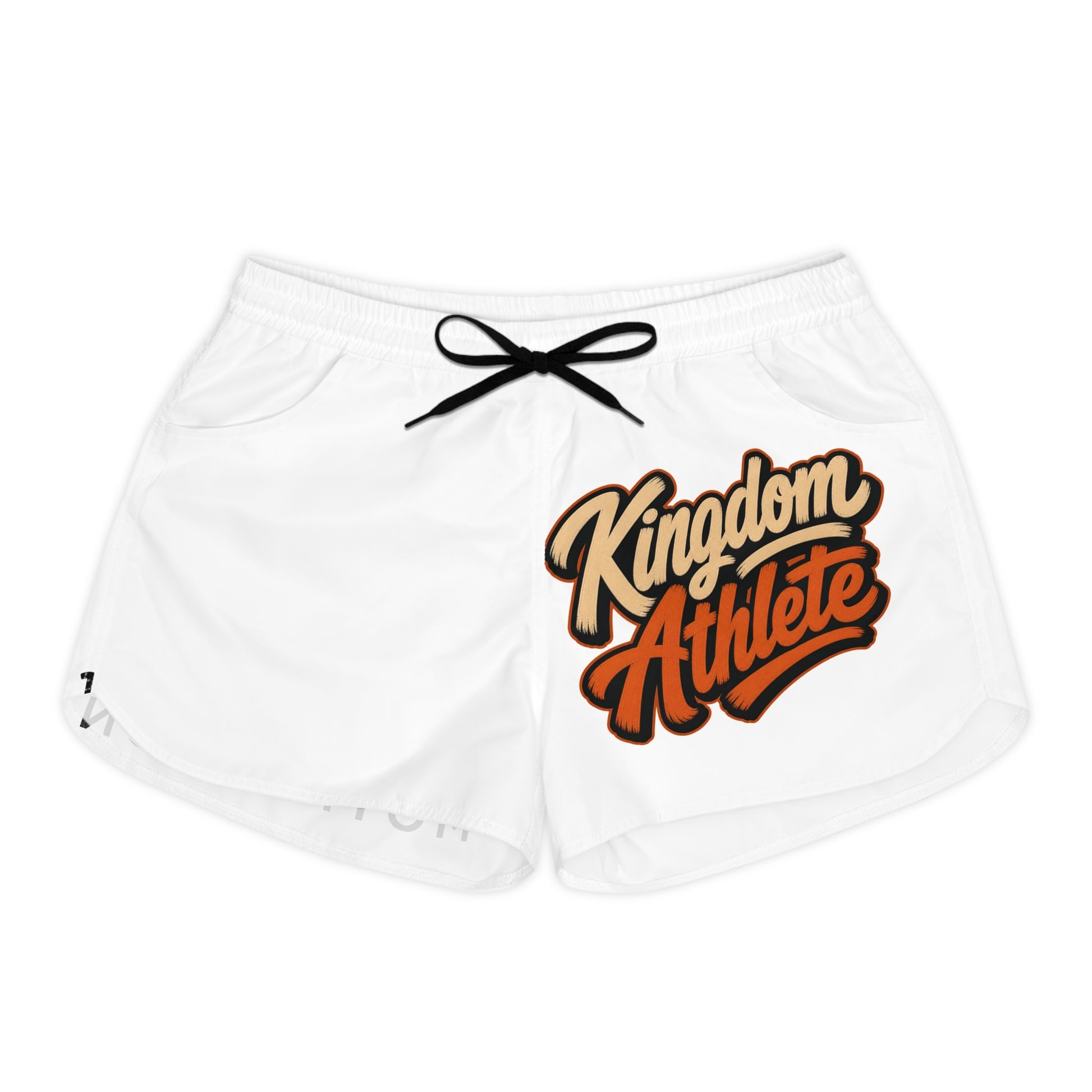 White shorts with black drawstring featuring "Kingdom Athlete" graphic in orange and tan.