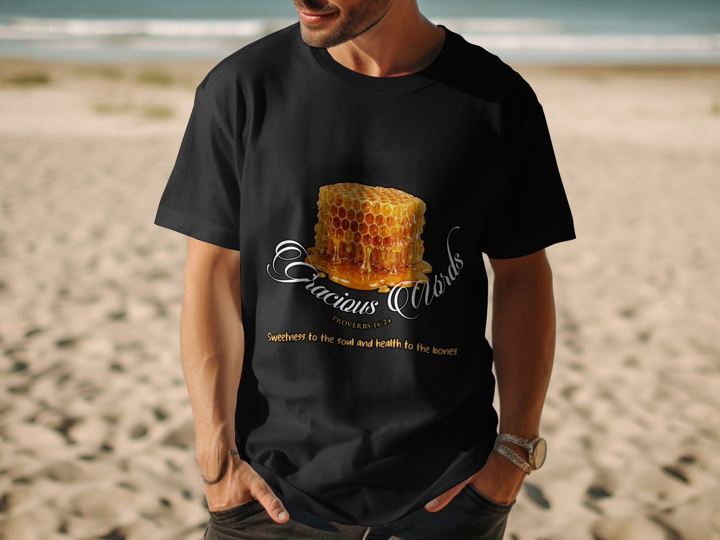 Black t-shirt with honeycomb graphic and text "Gracious Words Proverbs 16:24 Sweetness to the soul.".