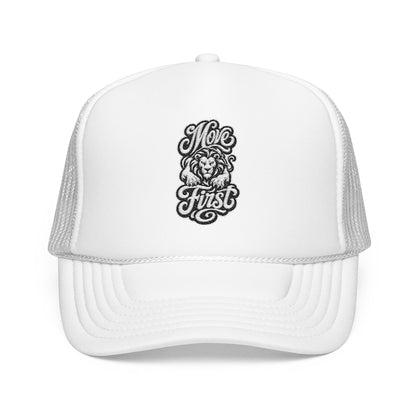 White trucker cap with embroidered "Move First" text and a lion graphic.