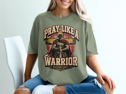 Green t-shirt with warrior graphic and text "PRAY LIKE A WARRIOR".