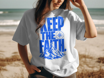 White t-shirt with blue text "KEEP THE FAITH" and mountain graphic.