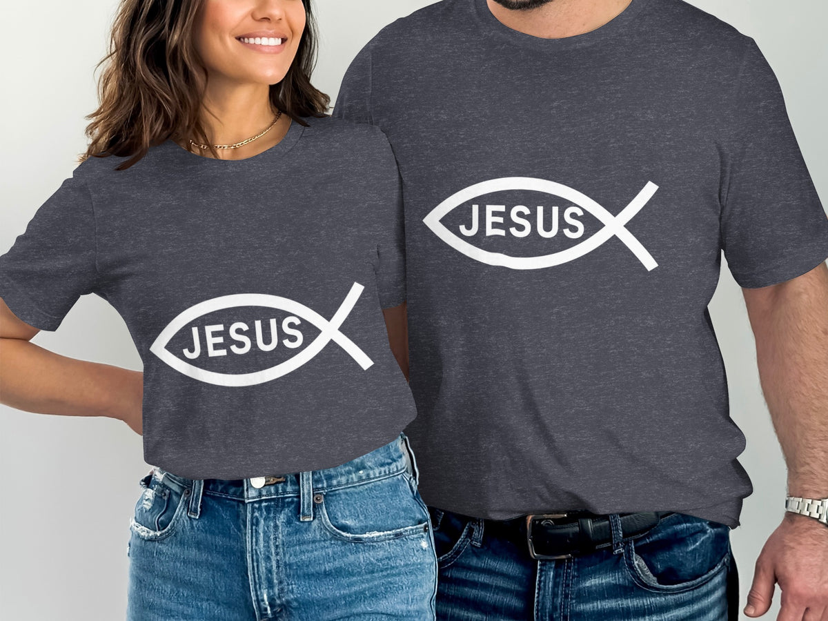 Couple wearing dark grey t-shirts with white Ichthys fish symbol and the word "JESUS."