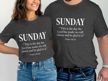 Two people wear dark grey t-shirts with white text: "SUNDAY" and Psalm 118:24.