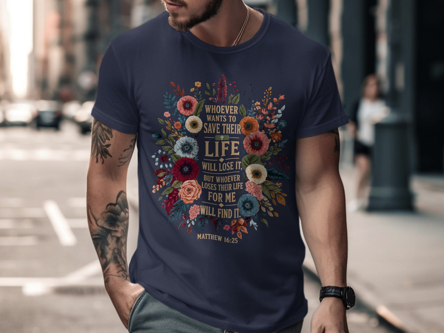 Dark blue t-shirt with floral design and "Whoever wants to save their life will lose it." scripture.