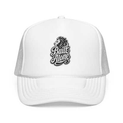 White trucker hat with "Built Alone" text and lion logo on front panel.