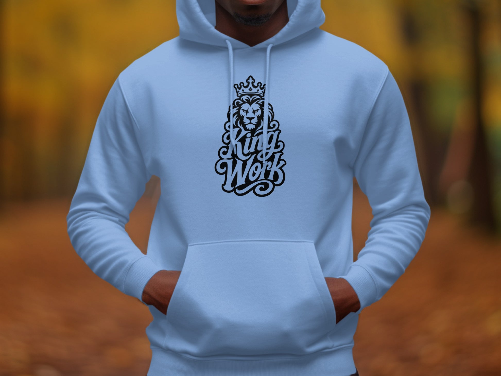Light blue hoodie with black lion and crown design and "King Work" text.