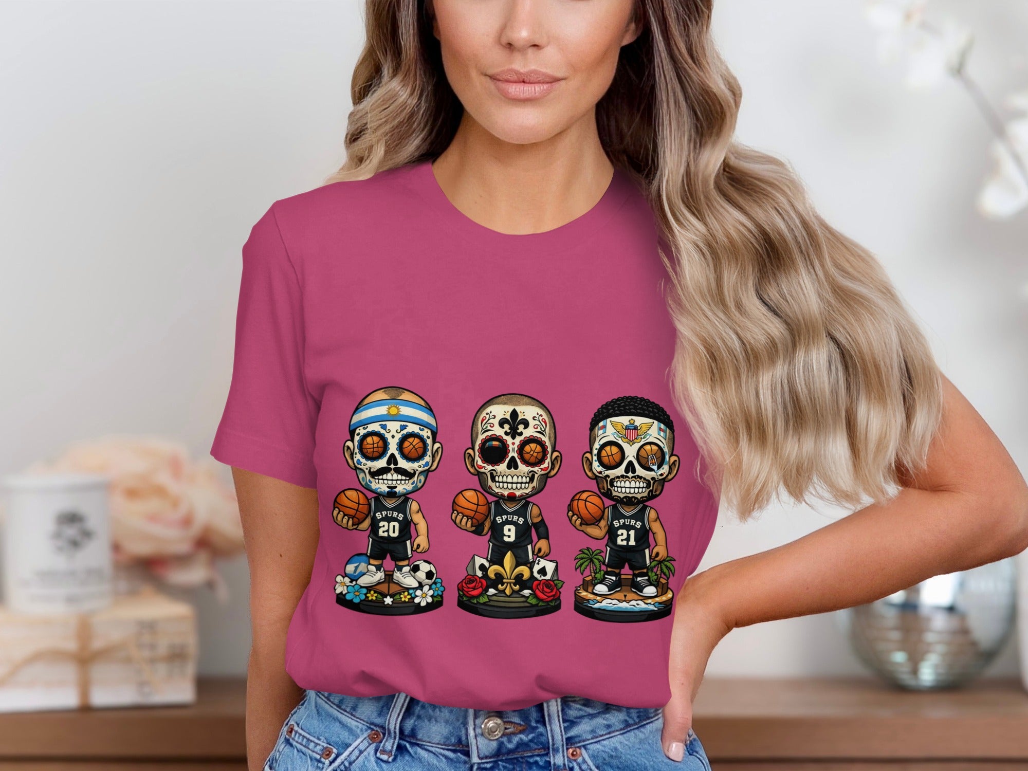Three sugar skull basketball players on a pink t-shirt.