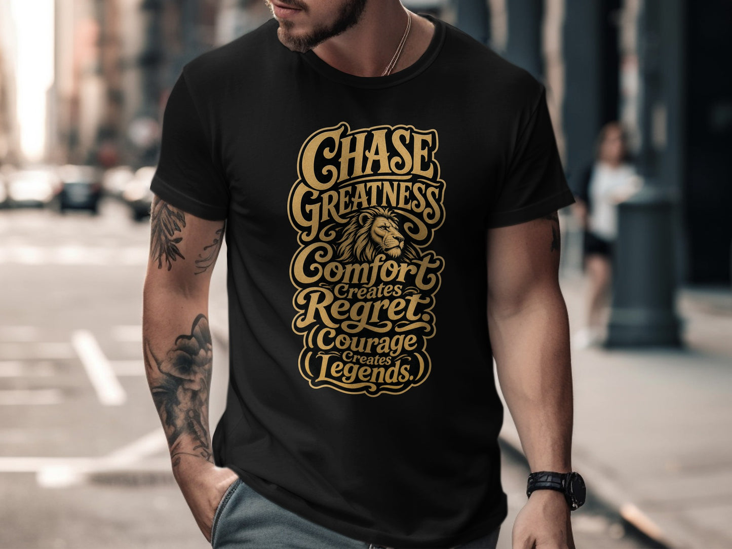 Black t-shirt with gold text: "Chase Greatness Comfort Creates Regret Courage Creates Legends."