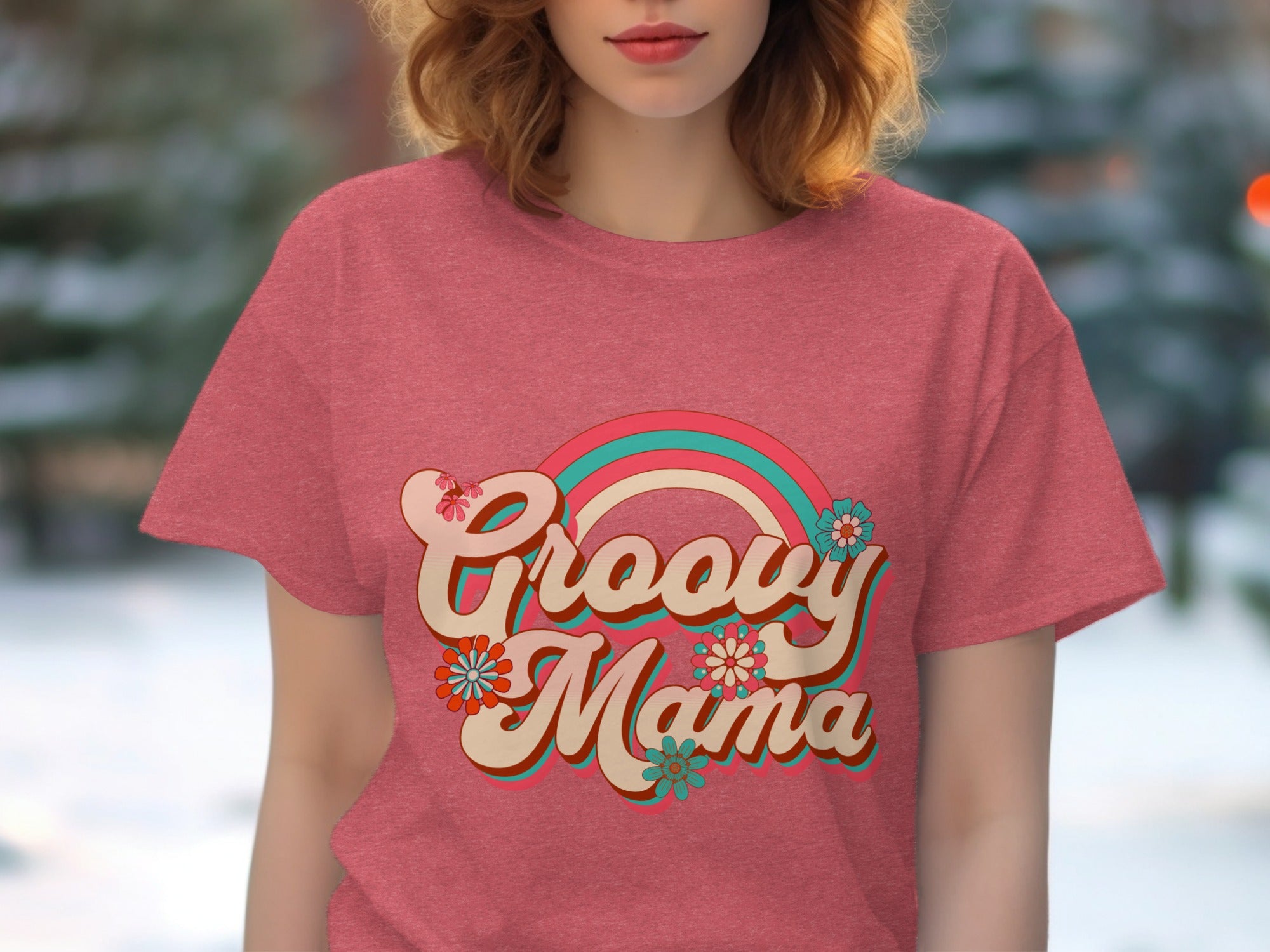 Red t-shirt with "Groovy Mama" text and retro rainbow and flower graphic.