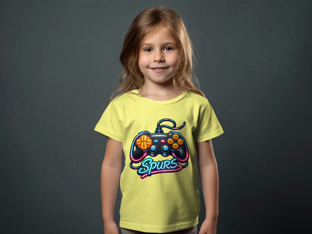 Child wearing a yellow t-shirt with a neon gamepad and "Spurs" graphic