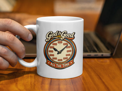 White mug with "God is Good All the Time" text and clock art.