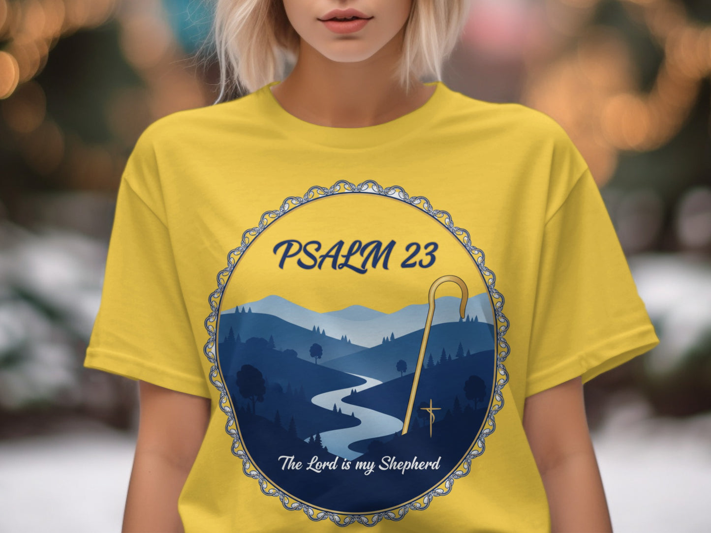 Yellow t-shirt with Psalm 23 design featuring a landscape, shepherd's crook, and cross.