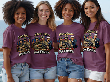 Four women wear matching t-shirts with a graphic of soldiers and text.