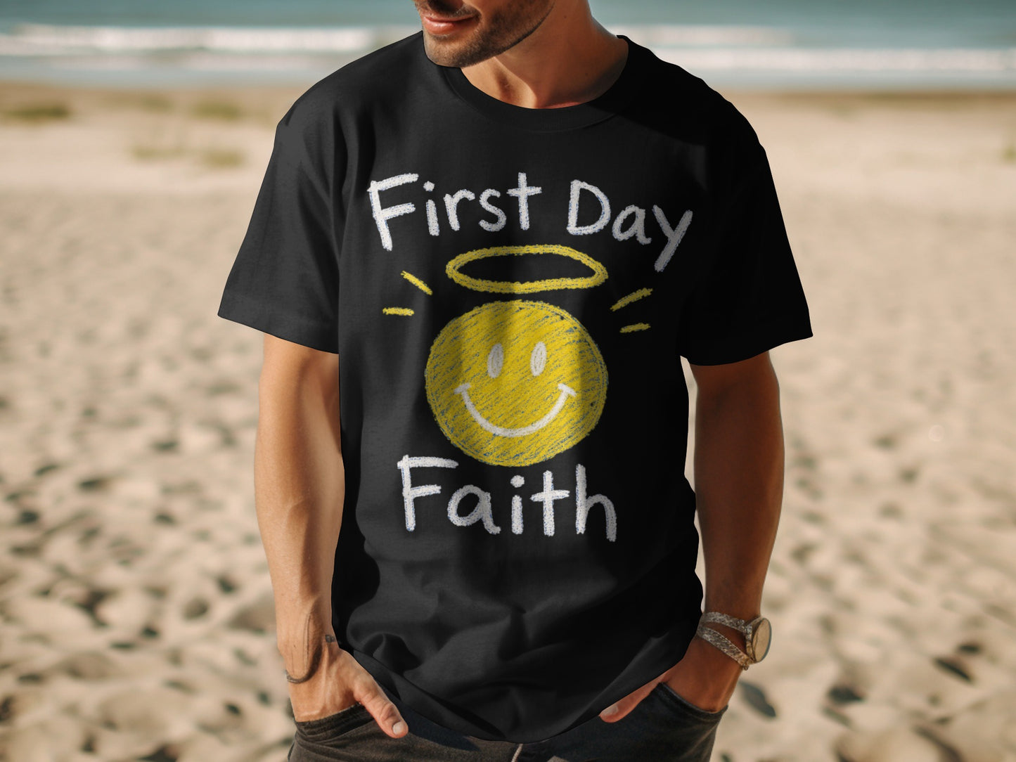Black t-shirt with "First Day Faith" text and a yellow smiley face with halo.