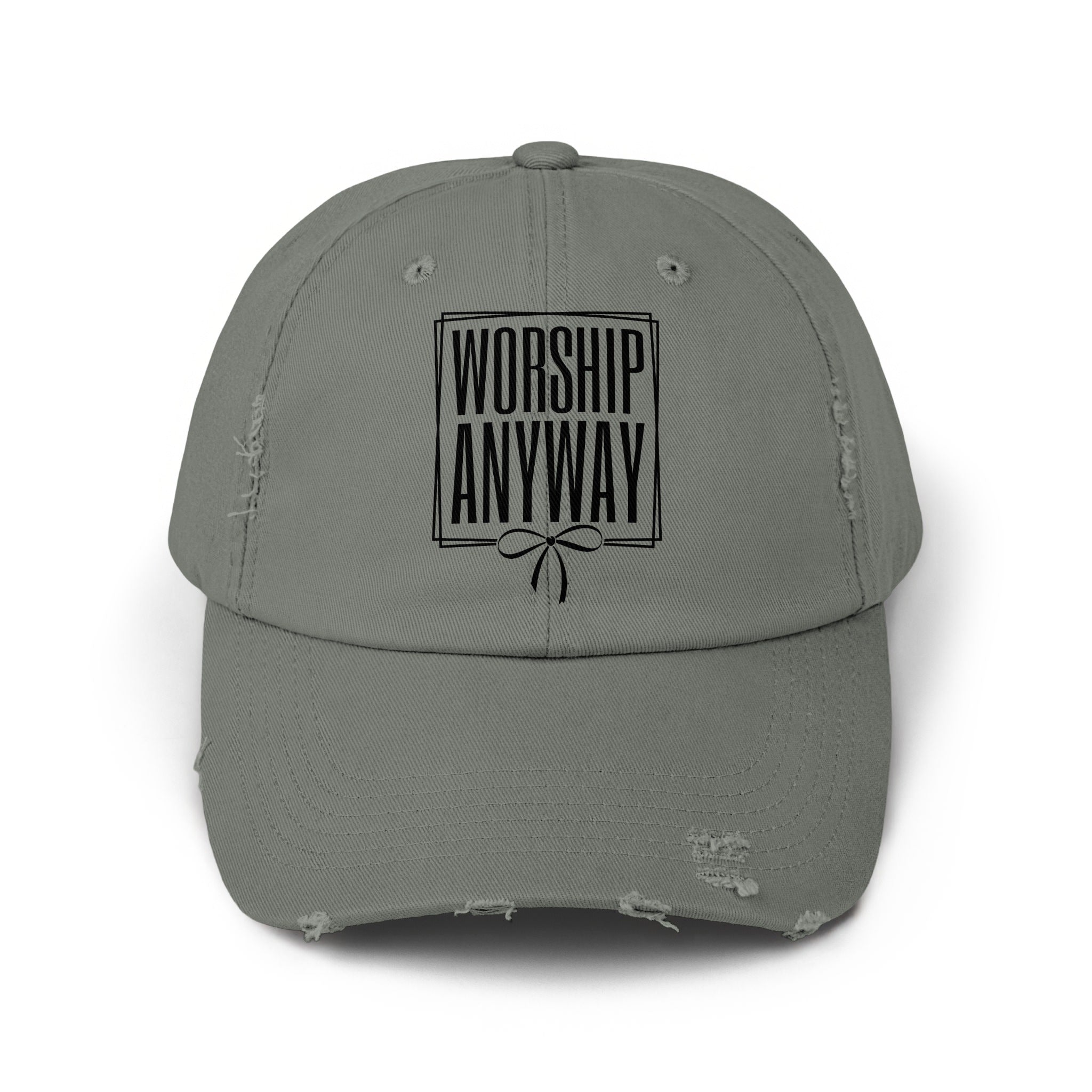 Tarnished grey distressed baseball cap with "WORSHIP ANYWAY" text above a bow.