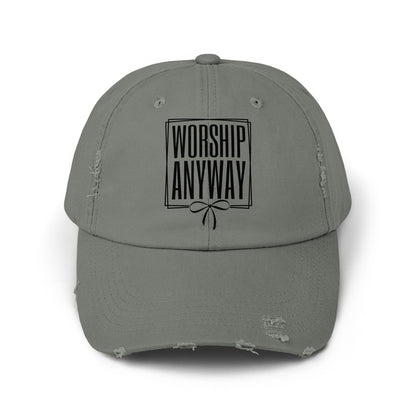 Tarnished grey distressed baseball cap with "WORSHIP ANYWAY" text above a bow.