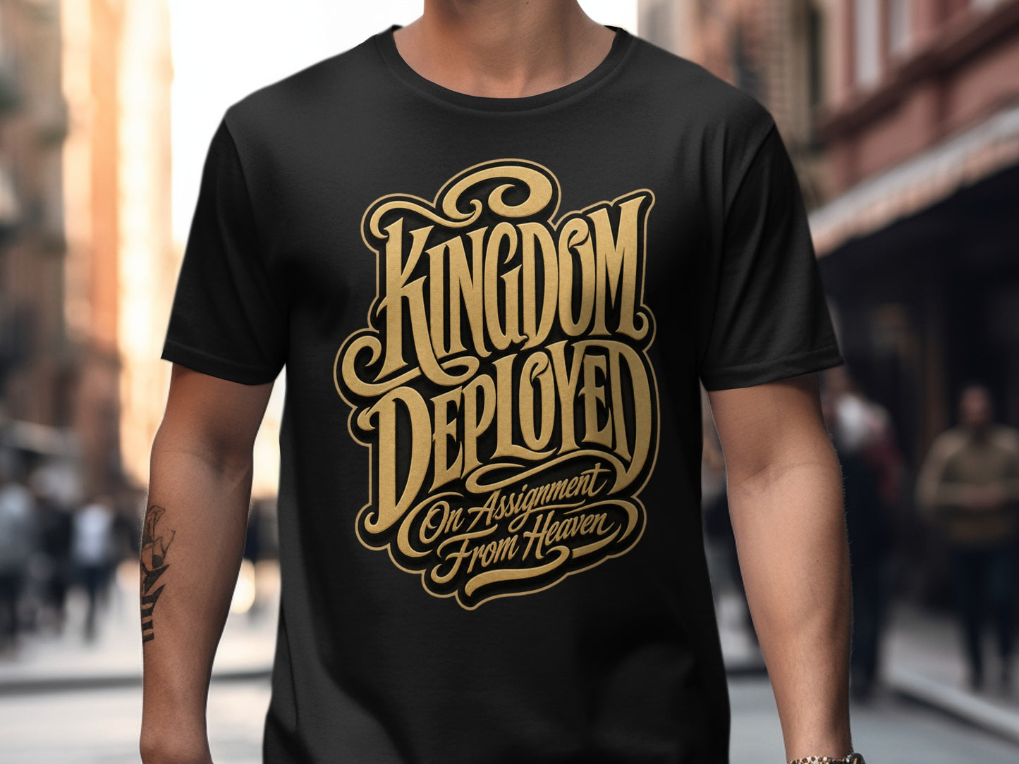 Black t-shirt with "Kingdom Deployed On Assignment From Heaven" in gold lettering.
