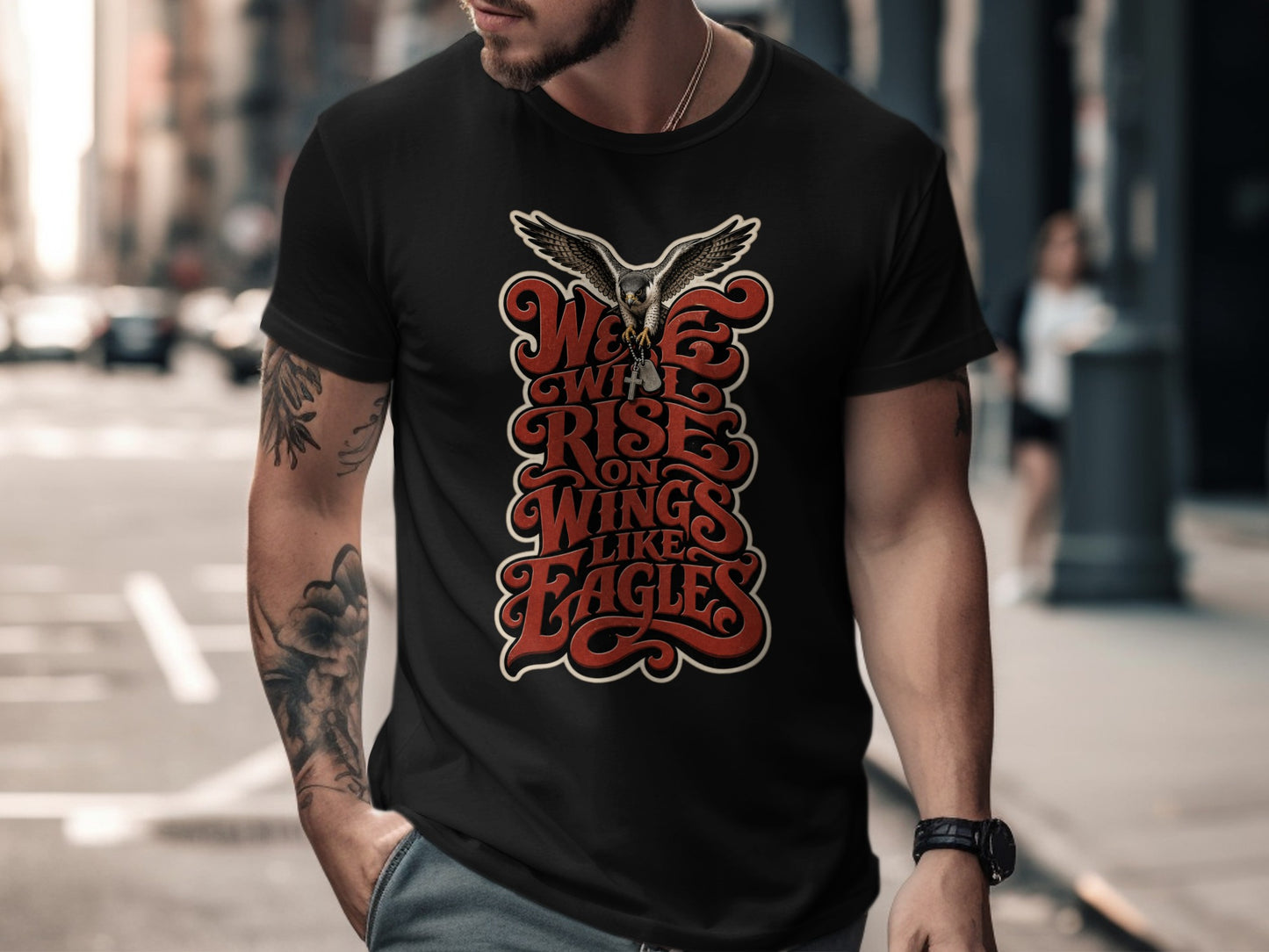 Black t-shirt with graphic "We Will Rise on Wings Like Eagles" and an eagle.