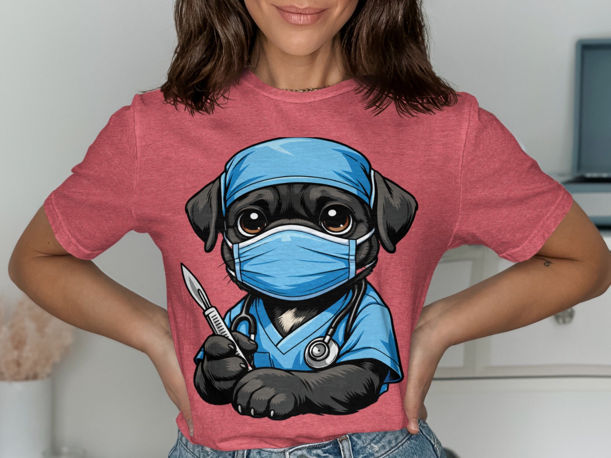 Black dog wearing scrubs, mask, surgical cap, and holding a scalpel.