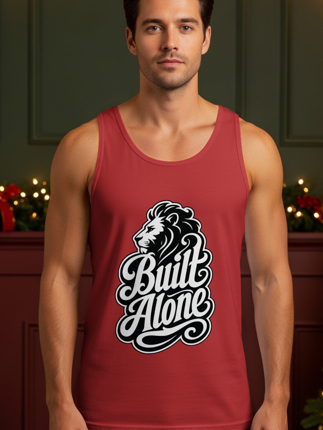 Red tank top with a black and white lion graphic and "Built Alone" text.