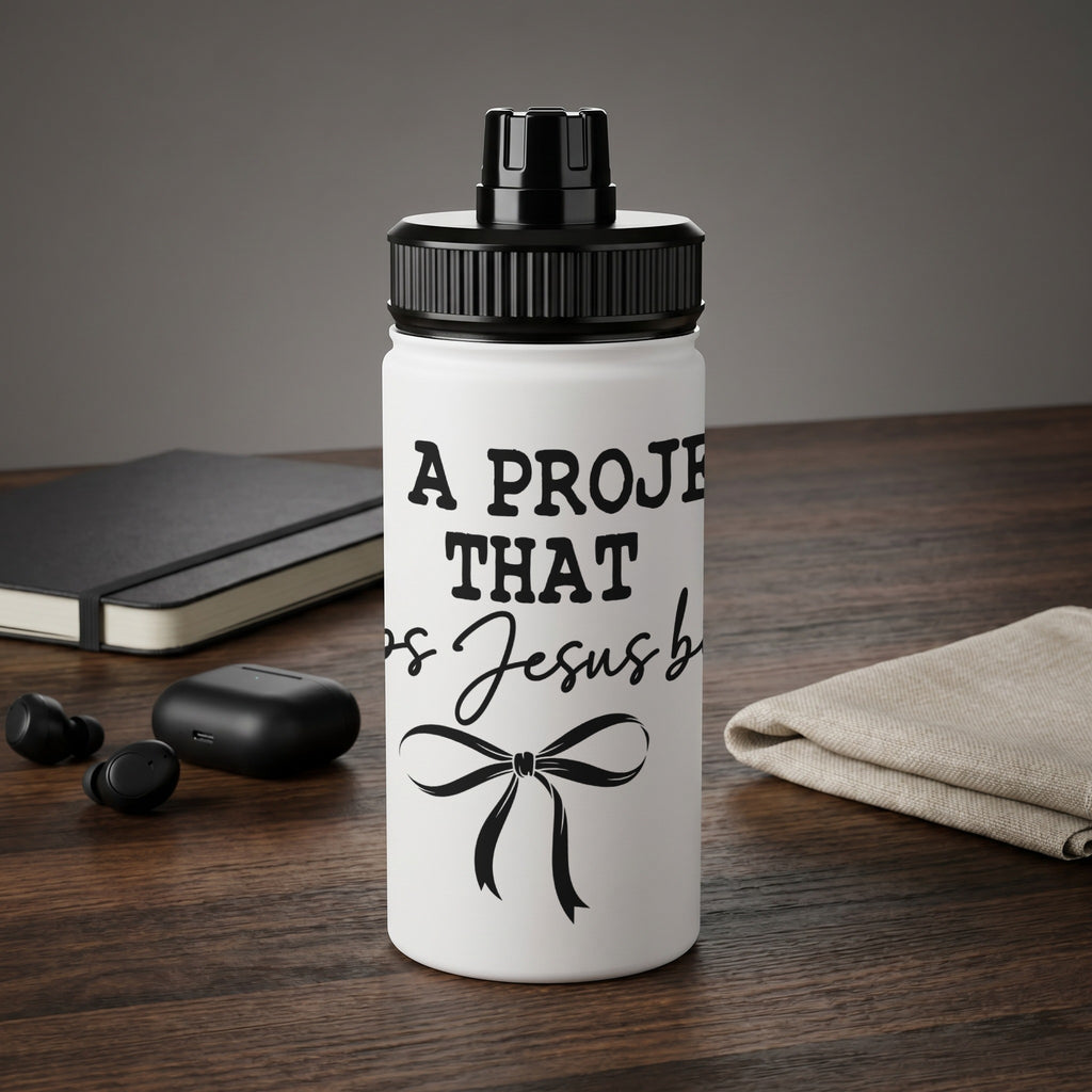 White water bottle with black text "A project that is Jesus blessed" and bow.