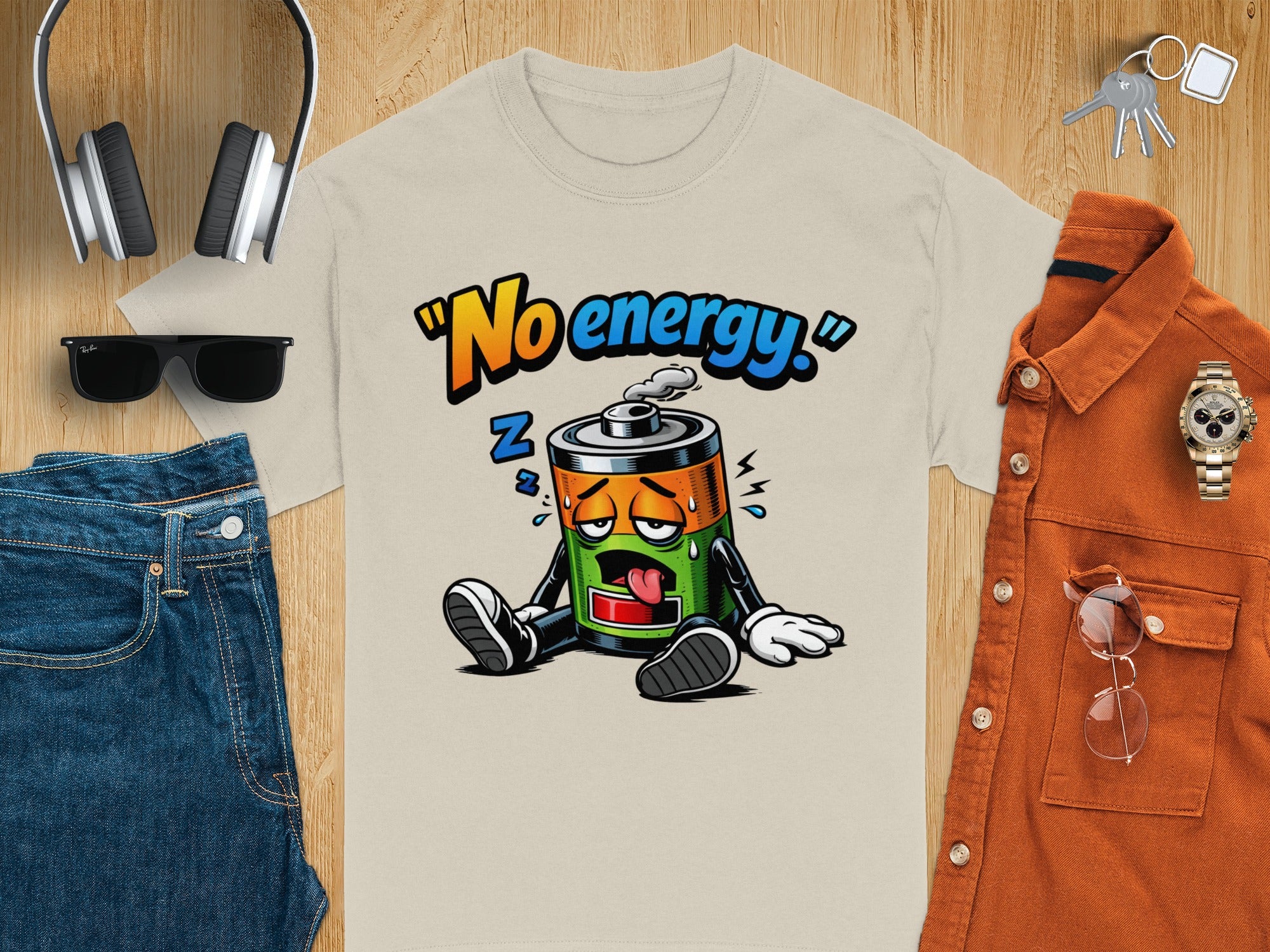 T-shirt with cartoon battery graphic that says "No energy"