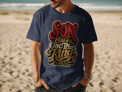 Navy t-shirt with "Son Child of the One True King" and 1 John 3:1 text.