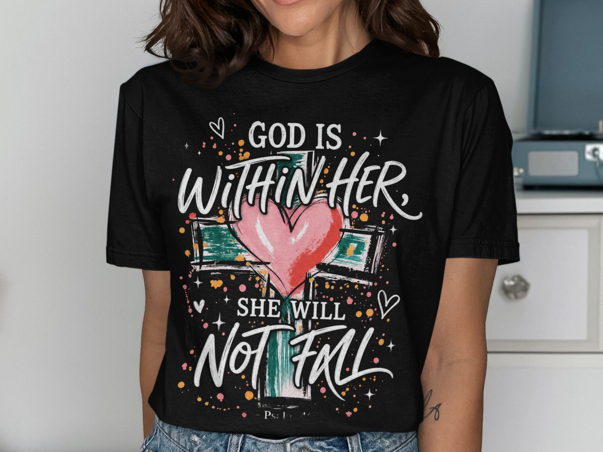 Black t-shirt with graphic: God is within her, she will not fall.