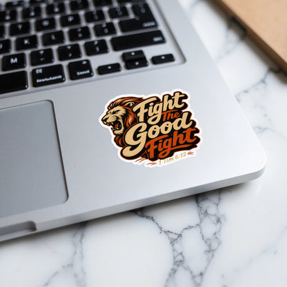 Lion sticker with text "Fight the Good Fight" and "1 Tim 6:12".