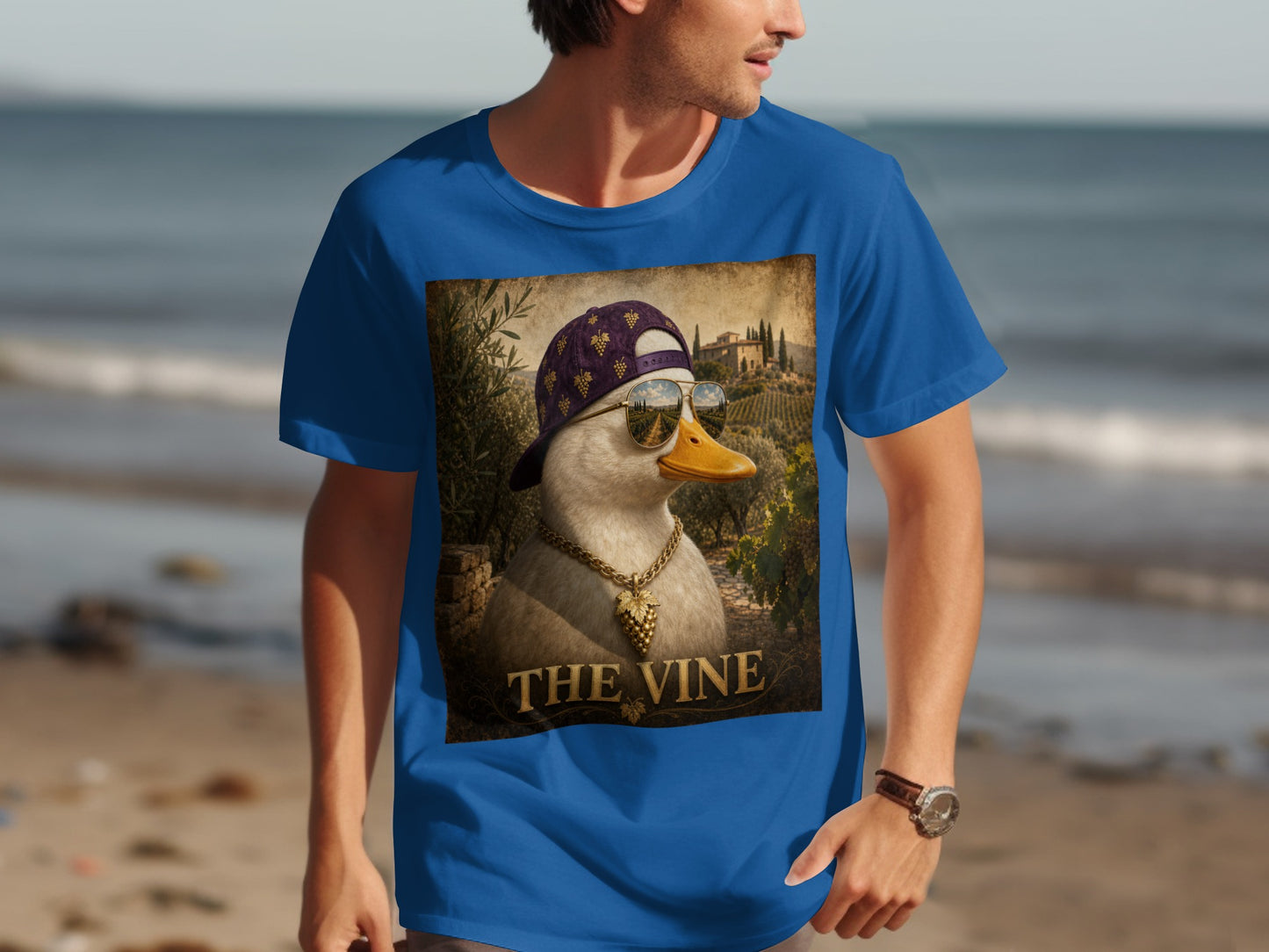 Duck wearing a backwards cap and sunglasses is on a t-shirt with "The Vine" text.
