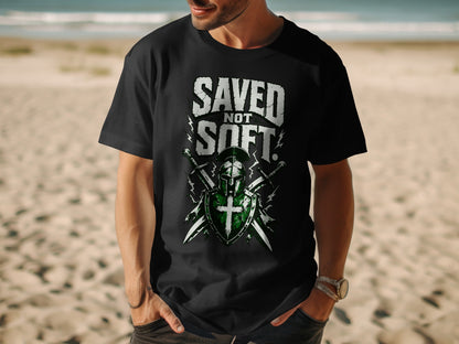 Black t-shirt with "Saved Not Soft" text and knight's shield design.