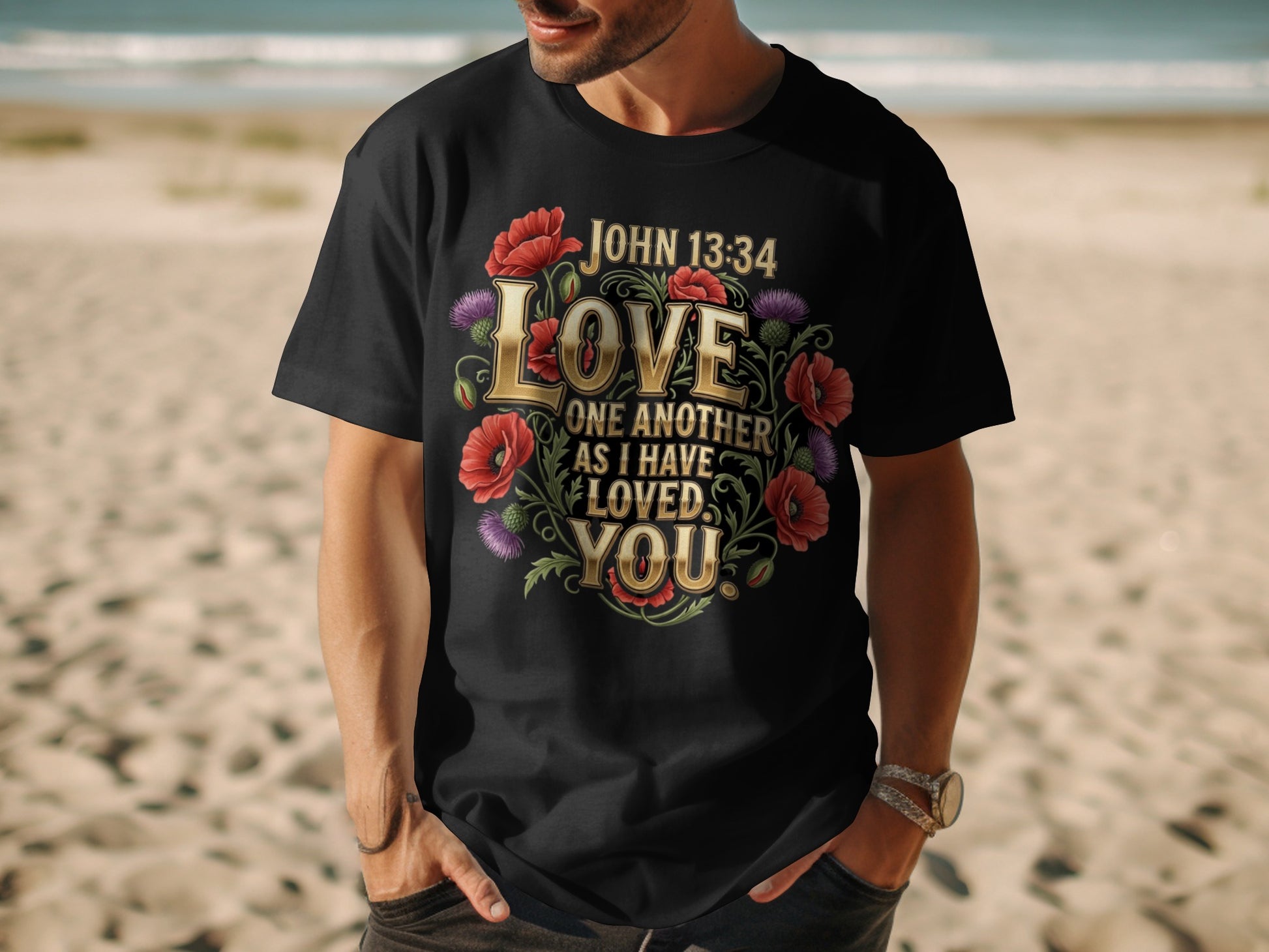 Black t-shirt with floral design and John 13:34 text: Love one another as I have loved you.