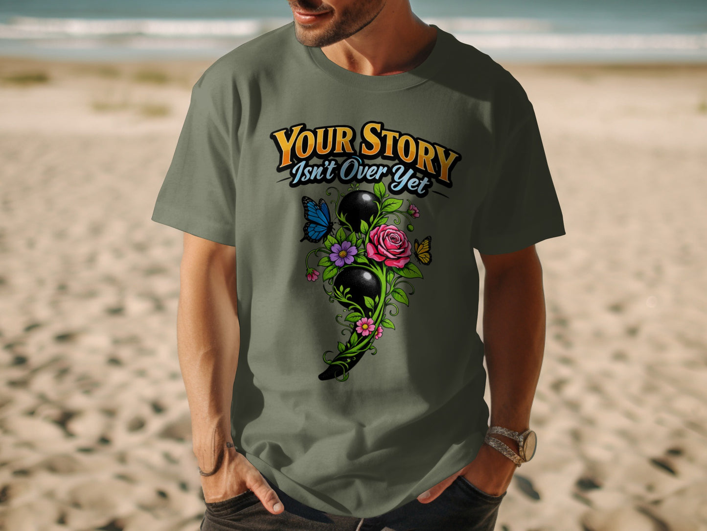T-shirt with "Your Story Isn't Over Yet" text and floral semicolon design.