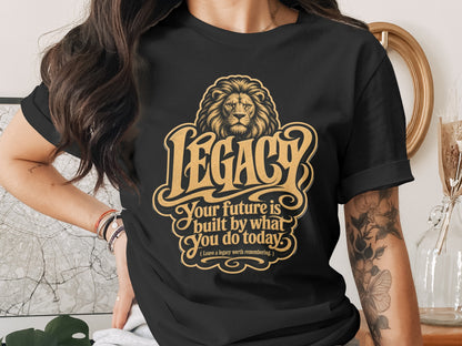 Black t-shirt with gold lion and text: LEGACY, Your future is built by what you do today.