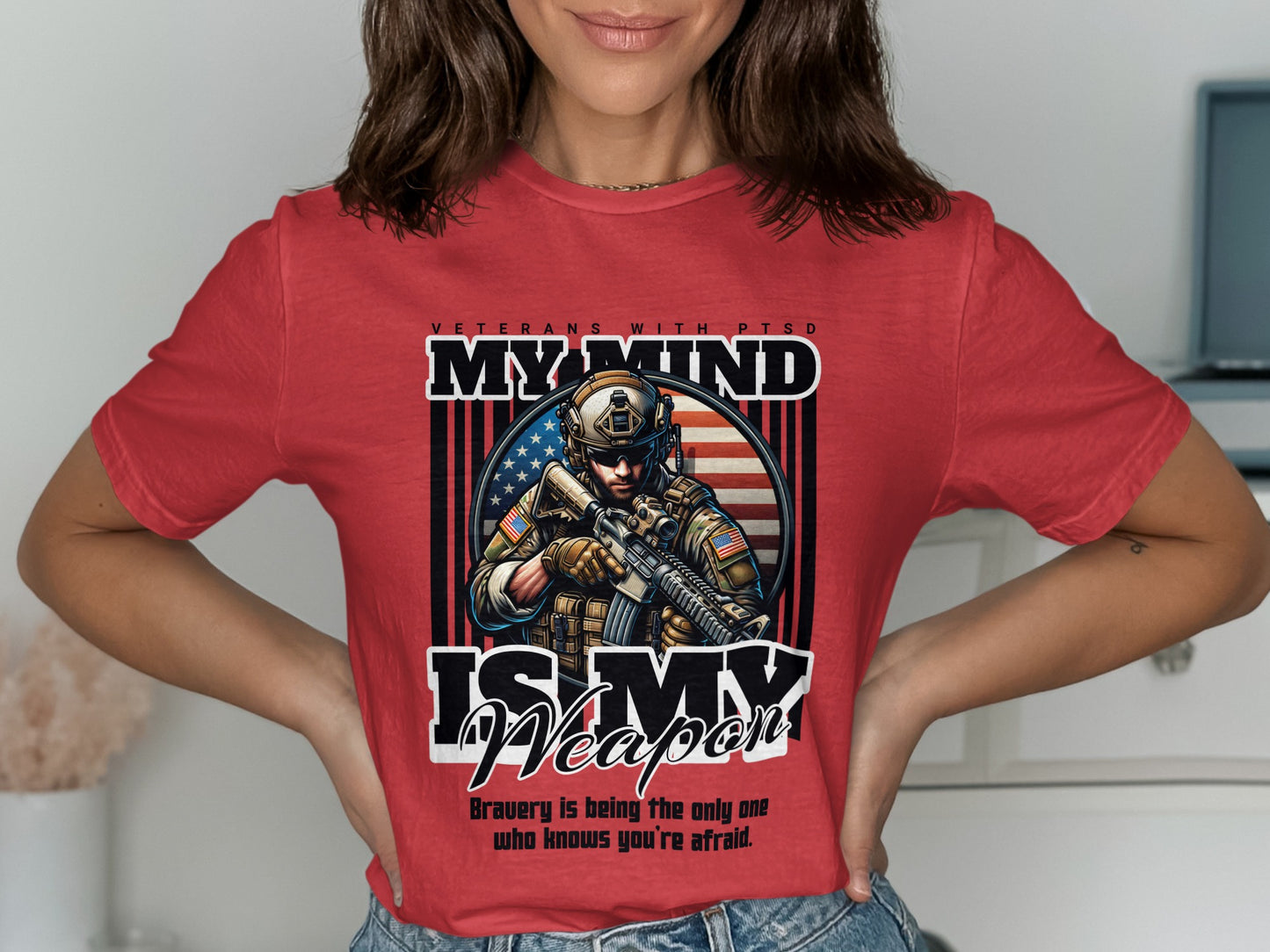 Red t-shirt with graphic of soldier, American flag, and text: "MY MIND IS MY WEAPON".