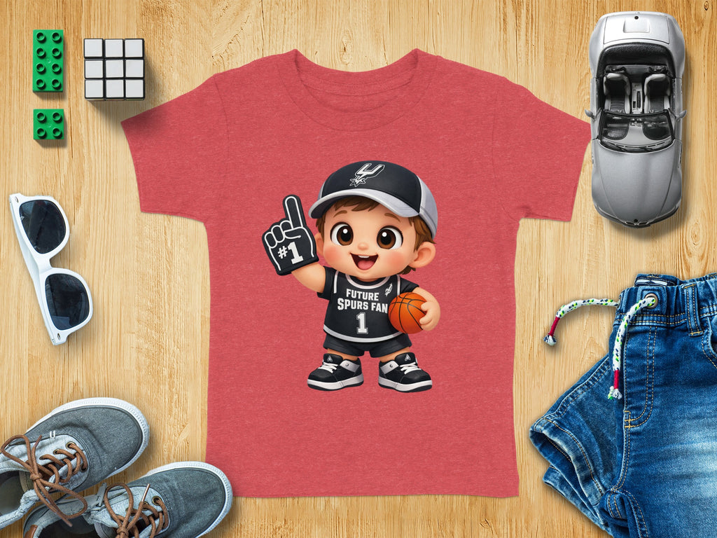 Kid's t-shirt with cartoon basketball player graphic and "Future Spurs Fan" text.