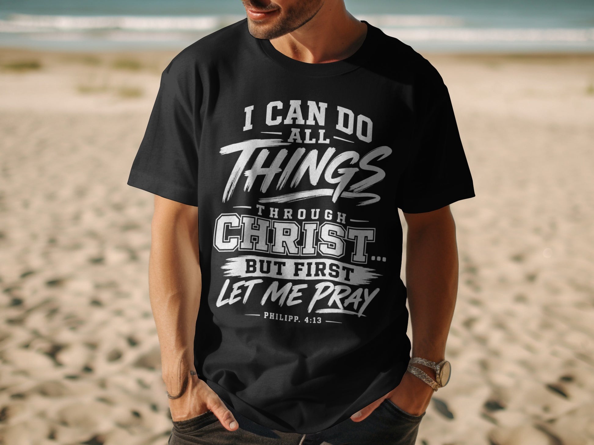 Black t-shirt with white text: "I CAN DO ALL THINGS THROUGH CHRIST... BUT FIRST LET ME PRAY PHILIPP. 4:13"