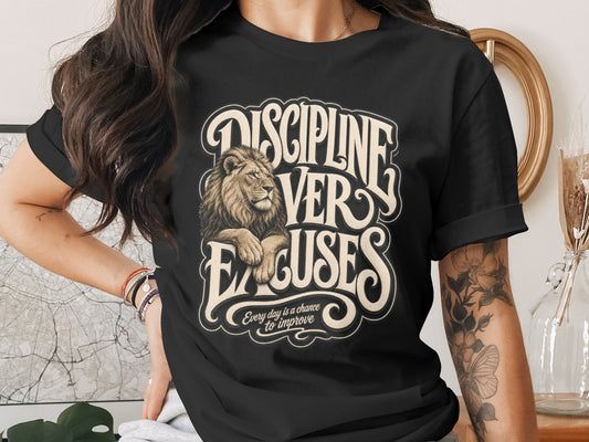 Black t-shirt with lion graphic and text "Discipline Ver Excuses".