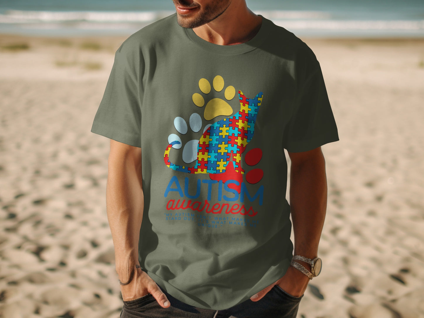 T-shirt with autism awareness cat and paw print graphic.
