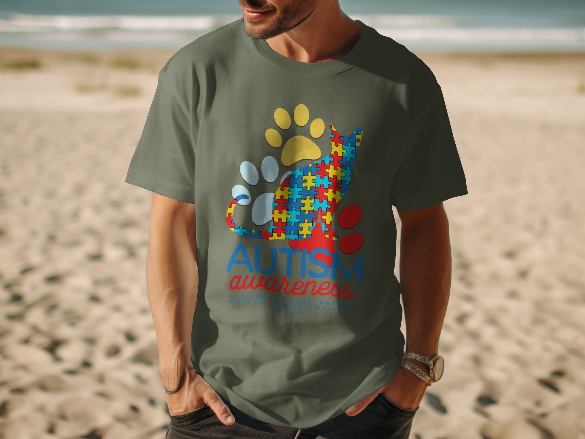 T-shirt with autism awareness cat and paw print graphic.