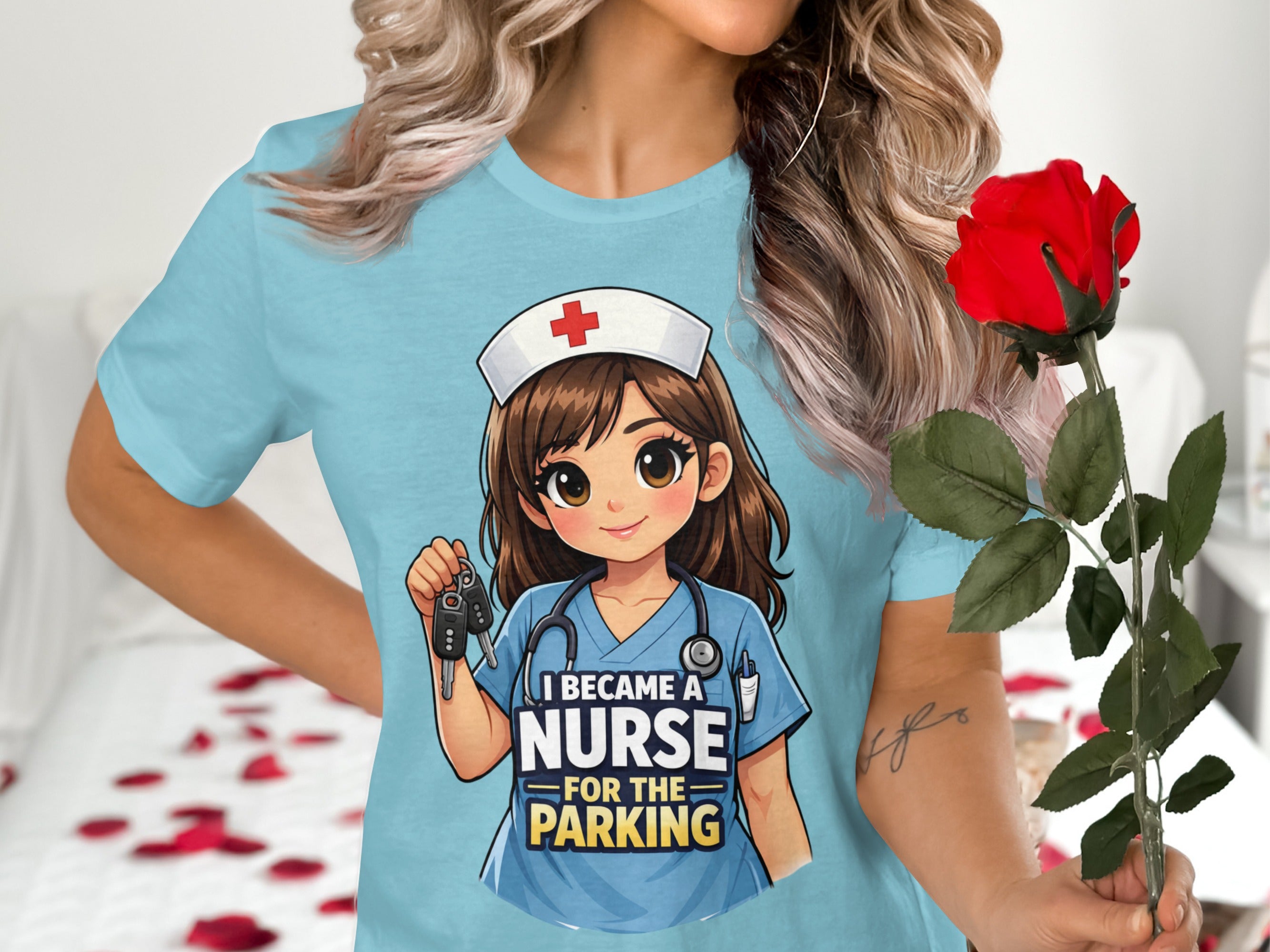 Light blue t-shirt with cartoon nurse holding keys, saying "I became a nurse for the parking."