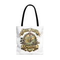 White tote bag with "Seek First The Kingdom" and "Matt 6:33" text and compass.