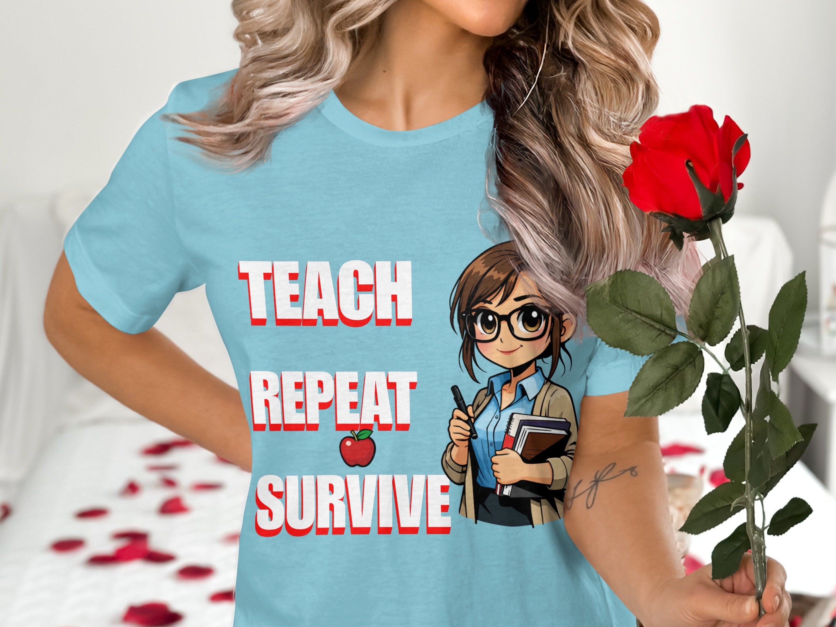 Light blue t-shirt with "TEACH REPEAT SURVIVE" text and teacher graphic.